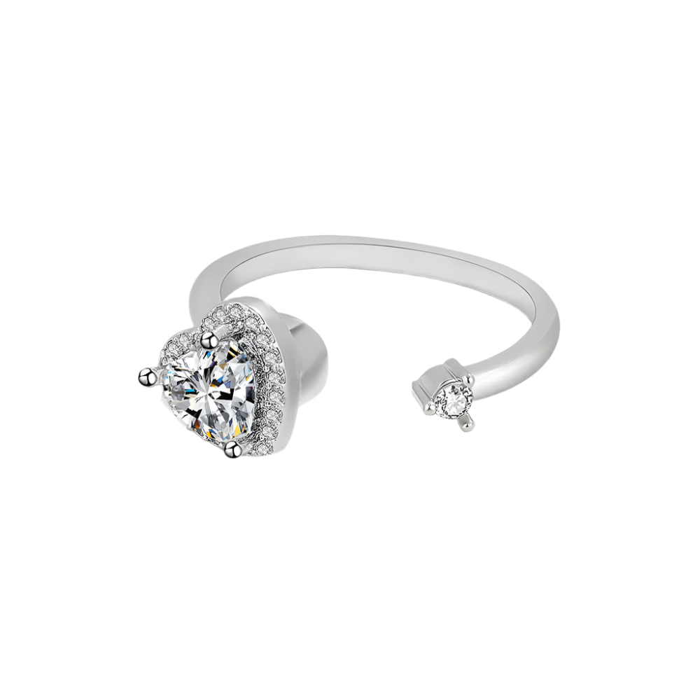 Silver ring with a large diamond and smaller diamond on a white background, perfect for ADHD people