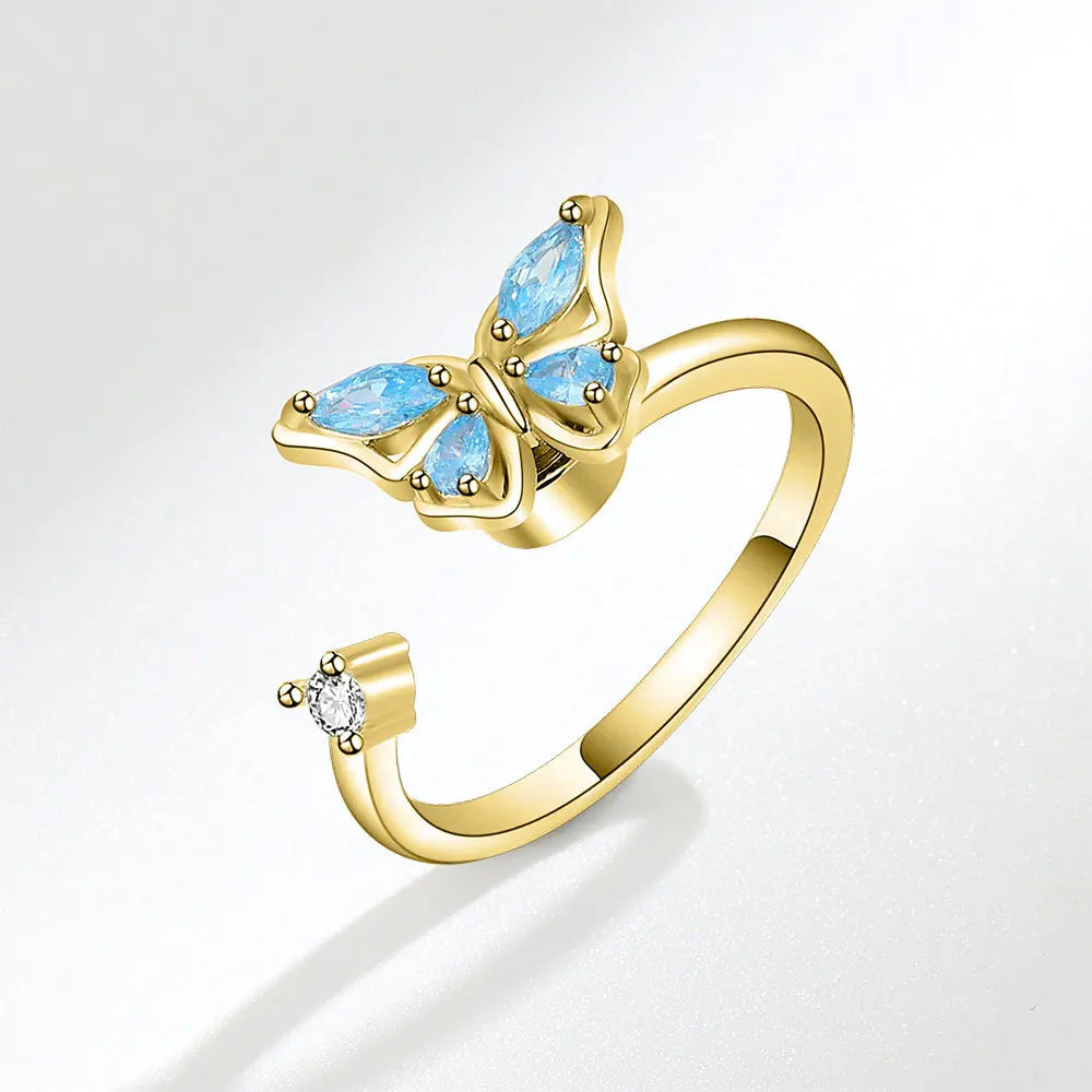 Wings of Transformation - Fidger Spinner Ring – Sterling Silver Elegance - Blue & Gold Edition